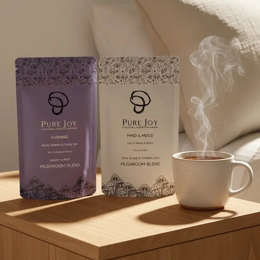Evening Blend and Mind and Mood blend by PURE JOY Mushrooms displayed on a bedside table — night-time relaxation and sleep ritual”