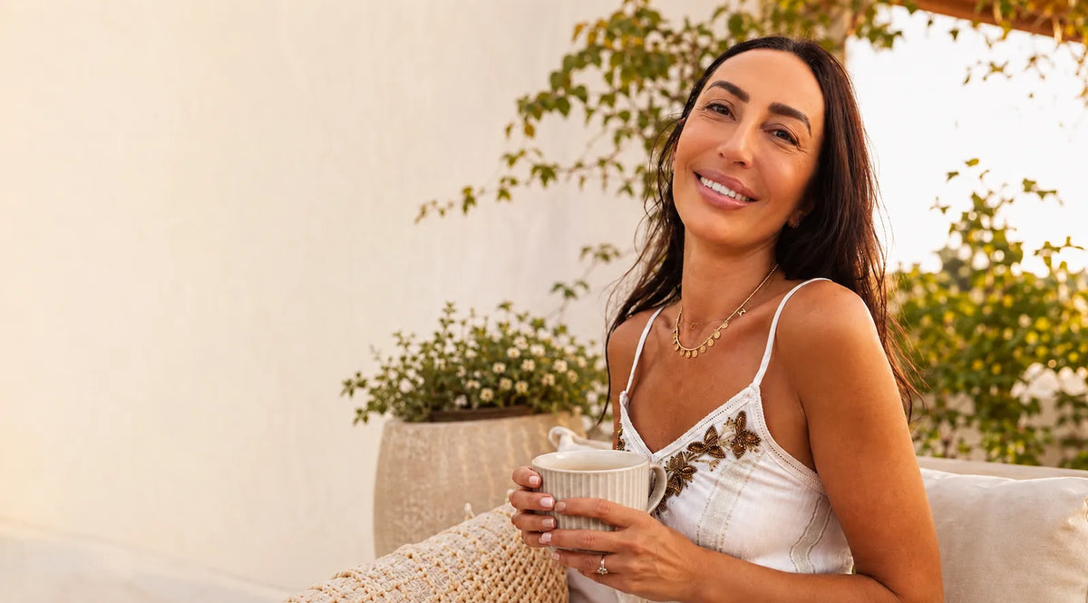 PURE JOY co-founder Giovanna enjoying a warm drink as part of her morning wellness ritual